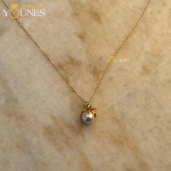 گردنبند طلا مروارید پاپیون گره